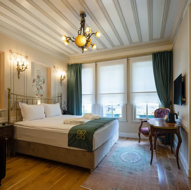غرفة ديلوكس بسرير كينج مع أريكة، Hotel Turkish House 1/5