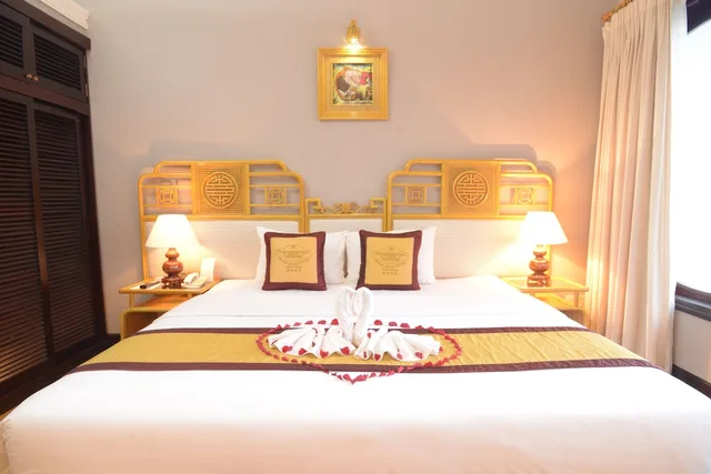 غرفة ديلوكس بسريرين منفصلين بإطلالة على الحديقة، Huong Giang Hotel 8/10
