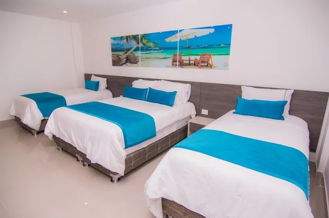 غرفة قياسية رباعية بسريرين مزدوجين، Hotel Poblado Covenas 1/5