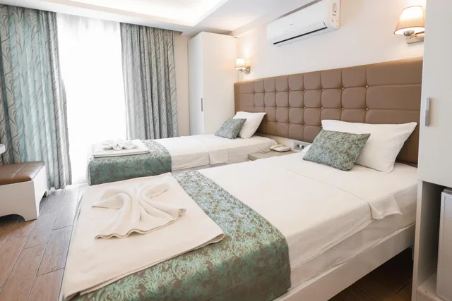 غرفة بسرير مزدوج أو سريرين منفصلين بإطلالة جزئية على البحر، Asli Hotel 6/10