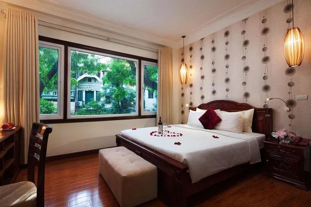 جناح عائلي بسرير كينج وسرير فردي، Hanoi Golden Moon Hotel 1/2