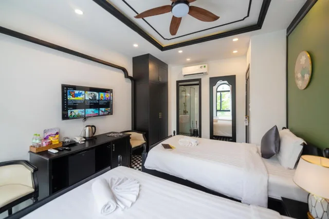 غرفة ديلوكس بسريرين منفصلين، Le Palmier Phu Quoc Hotel 1/4