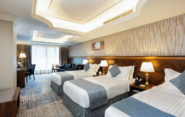 غرفة ثلاثية بثلاثة أسرّة، فندق مادن(Maden Hotel) 1/4