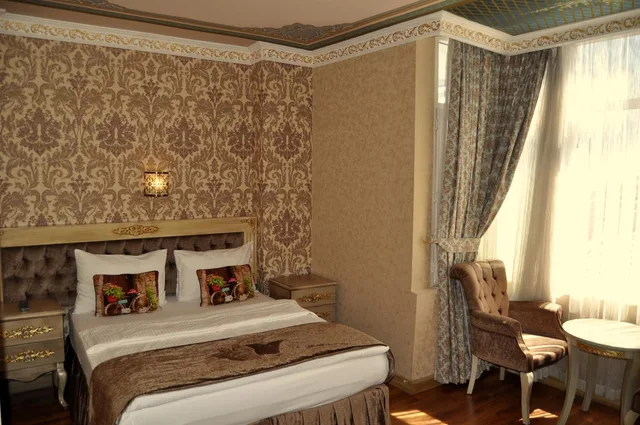 غرفة بسرير مزدوج أو سريرين منفصلين بإطلالة على البحر، Kaftan Hotel 8/10
