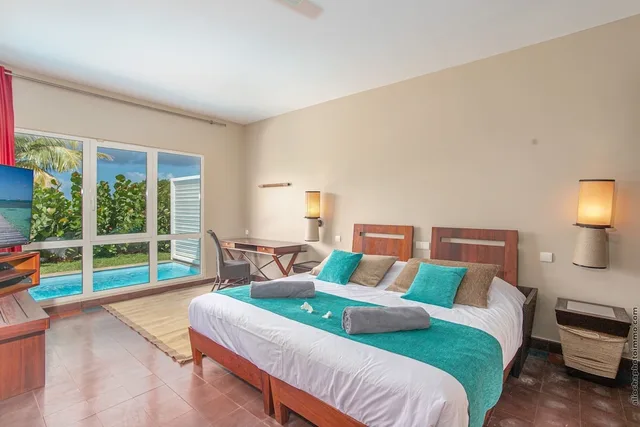 فيلا بسرير كينج بإطلالة على البحر بغرفة نوم واحدة مع أريكة بمسبح خاص، Le Cap Est Lagoon Resort 1/3