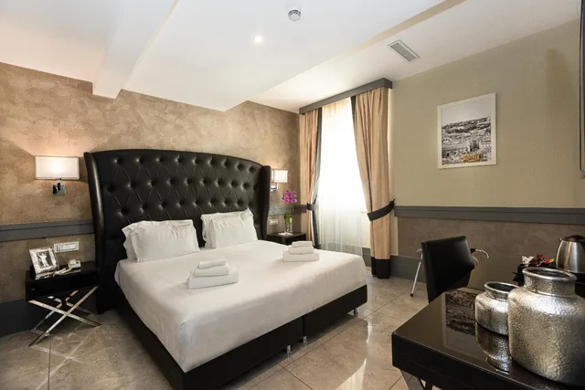 جناح جونيور بسرير كوين مع أريكة، Hotel Castellino Roma 2/8