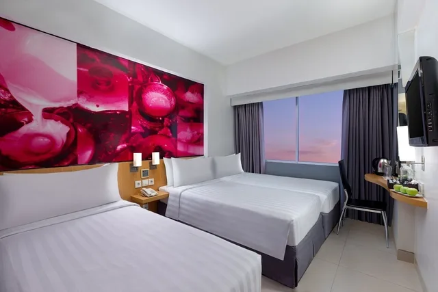 غرفة عائلية بسرير مزدوج وسرير فردي، favehotel Manahan - Solo 5/8