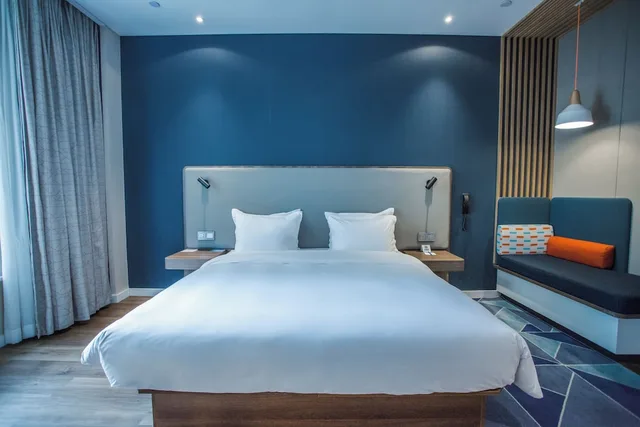 جناح بسرير كينج مع أريكة، Holiday Inn Express Shanghai Pudong Chuansha 1/2