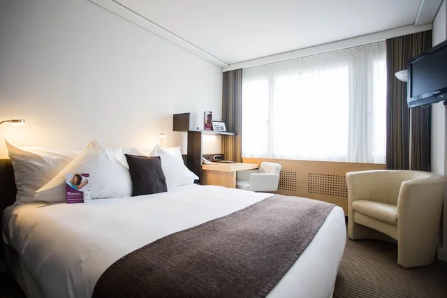 غرفة بريميوم بسرير كوين، Crowne Plaza Zurich 1/10