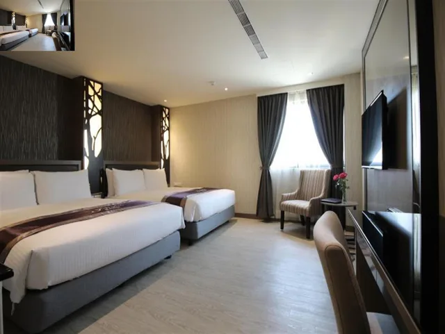 غرفة ديلوكس رباعية بسريرين مزدوجين، J Hotel 1/3