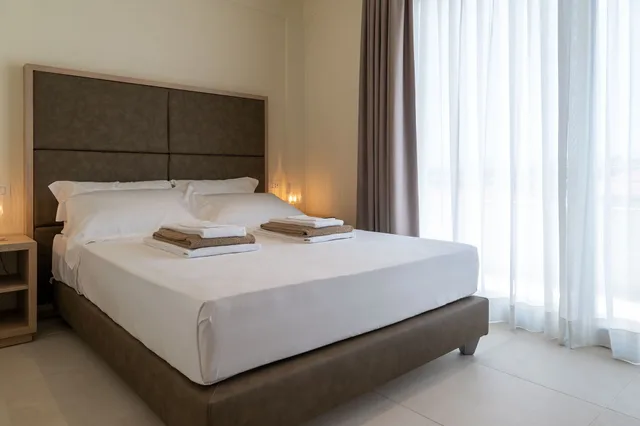 غرفة عائلية بسرير كوين مع أريكة، Palace Lido Hotel and Suites 1/2