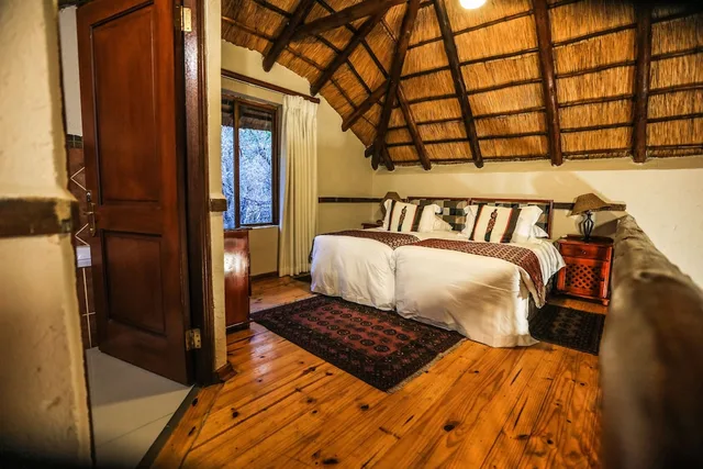 شاليه عائلي بسريرين منفصلين بإطلالة على الحديقة بغرفتي نوم، Grand Kruger Lodge And Spa 2/6