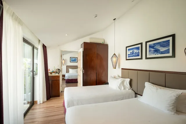 جناح عائلي بسرير كينج وسريرين منفصلين، Senvila Boutique Hoi An Resort And Spa 3/9