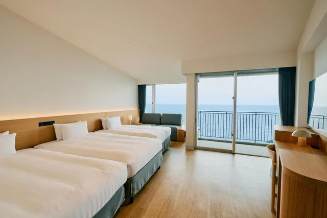 غرفة قياسية بسريرين منفصلين بإطلالة على البحر مع أريكة، Samana Hotel Yakushima 3/3