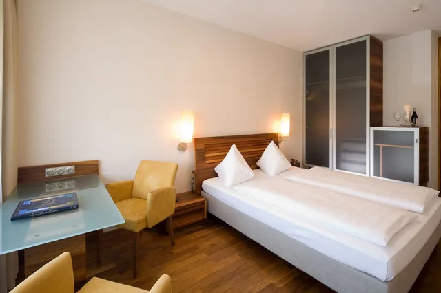غرفة بزنس مفردة بسرير كوين، Penz Hotel West 1/4
