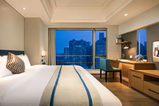 غرفة ديلوكس بسرير كينج وسريرين منفصلين بغرفتي نوم، SOMERSET SWAN LAKE HEFEI 2/6
