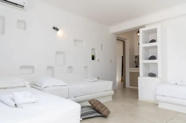 شقة اقتصادية بسرير كوين وسريرين فرديين، Ampelos Inn 1/8