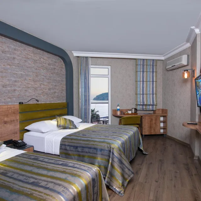 غرفة سوبيريور بسرير مزدوج أو سريرين منفصلين بإطلالة على البحر، Monart City Hotel All Inclusive 1/4