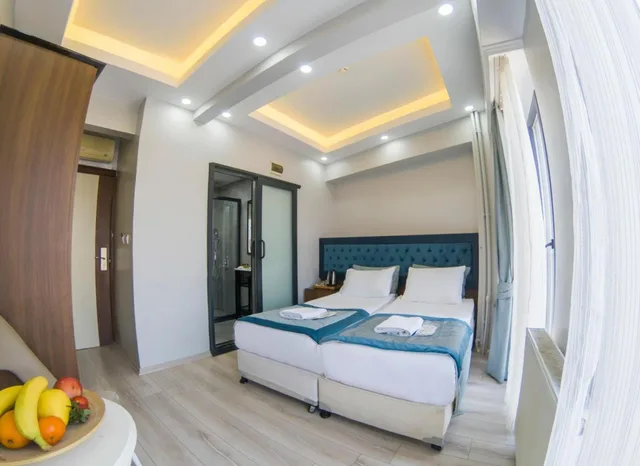 غرفة بسرير مزدوج بإطلالة على البحر بشرفة، Hotel Esen 1/6