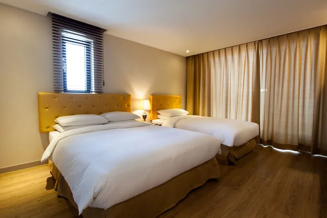 غرفة ديلوكس بسرير مزدوج وسرير فردي، Haema Hotel 5/8