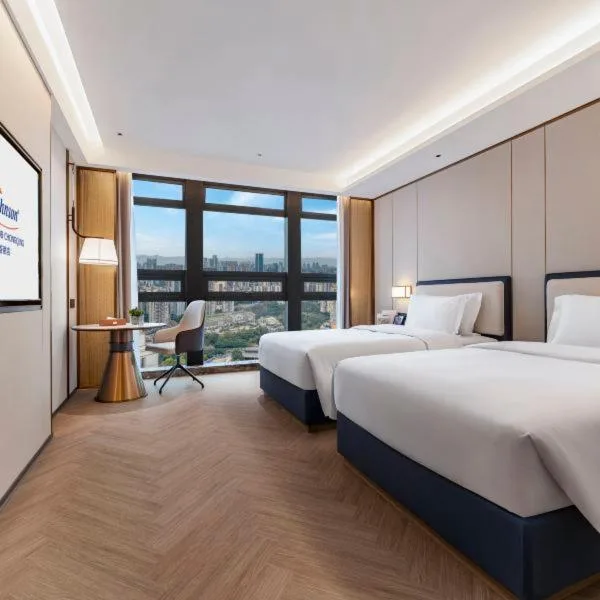 غرفة ديلوكس بسريرين منفصلين، Howard Johnson Jiazhou Business Club Chongqing 2/6