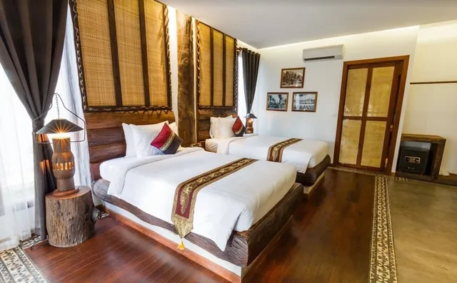 غرفة بريميير ديلوكس بسريرين منفصلين بشرفة، JAVA WOODEN VILLA 1/3