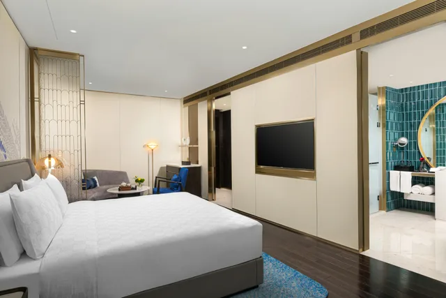 غرفة بريميوم بسرير كينج مع دخول الصالة، HUALUXE Shanghai Changfeng Park 1/8