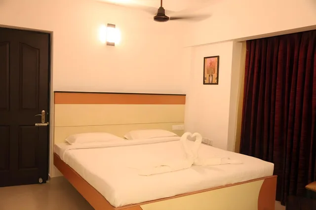 غرفة ديلوكس، Hotel Karpagam International 1/2