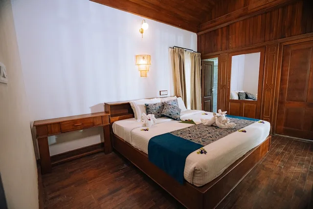 بنغل ديلوكس بسريرين كوين بغرفتي نوم مع أريكة، Elixir Woods Resort And Spa 1/1