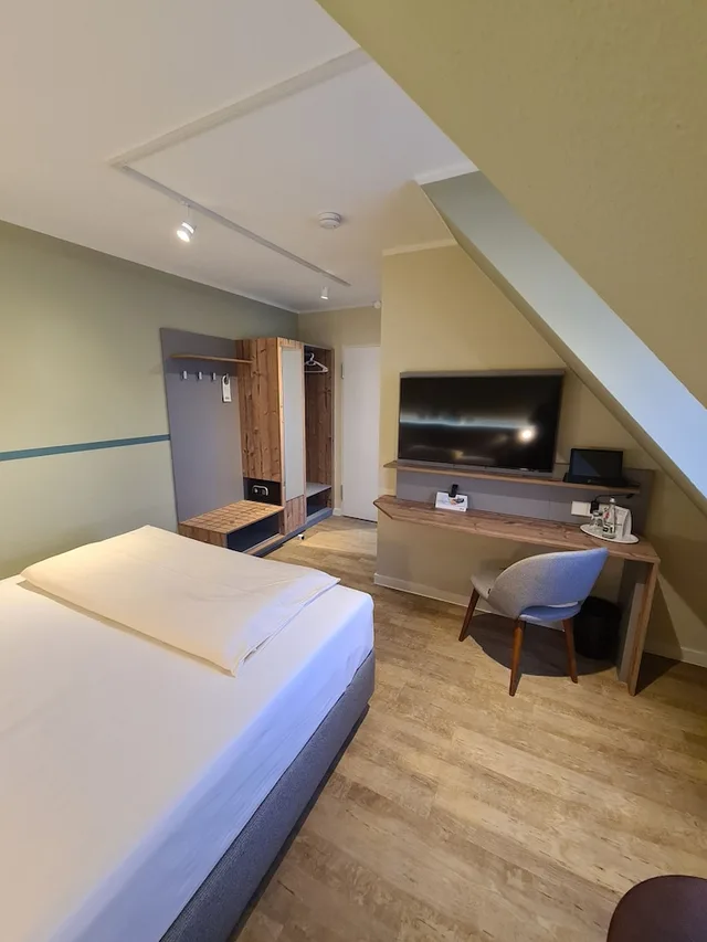 غرفة مفردة بسرير مزدوج في الملحق، Stadthotel Engel 1/10