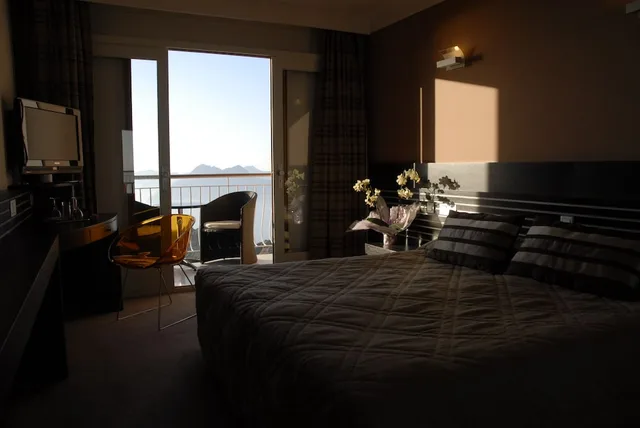 غرفة سوبيريور بسرير كوين بإطلالة على البحر بشرفة، Hotel Capo Rosso 2/2