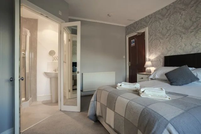 غرفة عائلية ثلاثية بسرير مزدوج وسرير فردي، Lyndale Guest House 3/5