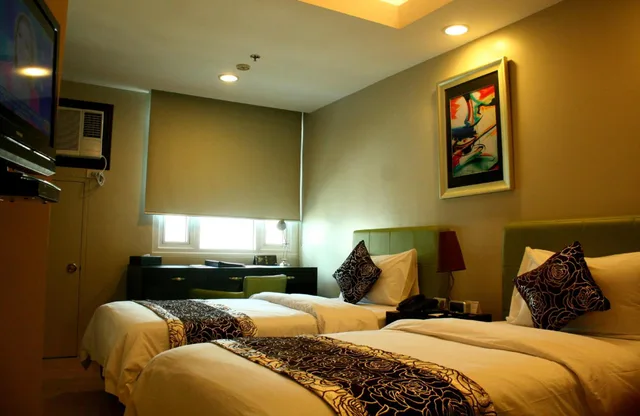 غرفة كلاسيكية بسريرين منفصلين، The Exchange Regency Residence Hotel 1/10