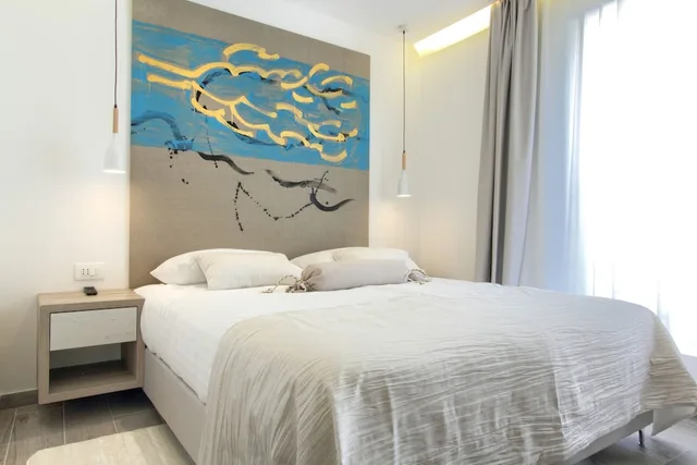 جناح ديلوكس بسريرين مزدوجين بإطلالة على البحر بشرفة بغرفتي نوم مع أريكة، Kalamota Beach House 1/2
