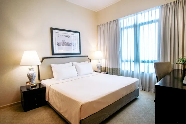 غرفة بسرير كينج وسرير فردي بغرفتي نوم، Great World Serviced Apartments 1/10