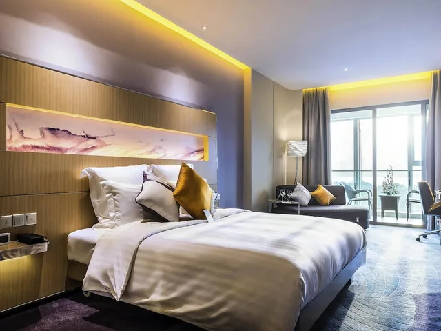 غرفة ديلوكس بسرير كينج بشرفة، Novotel Suzhou Sip 2/6