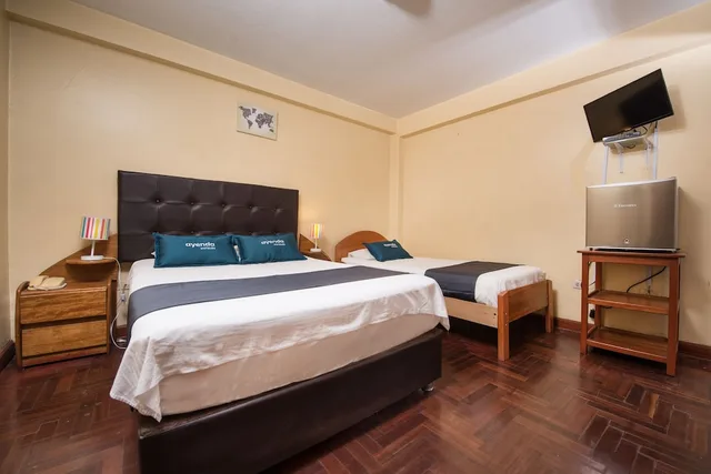 غرفة قياسية بسرير مزدوج وسرير فردي، Posada Inn 2/3