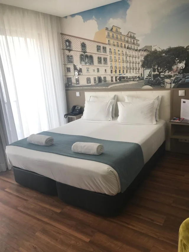 غرفة بسرير كينج وسرير كوين، FENICIUS CHARME HOTEL 1/6