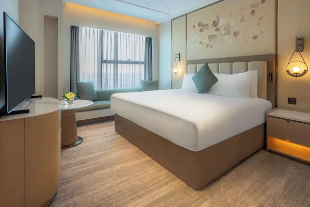 غرفة متصلة عائلية بسرير كينج وسريرين مزدوجين، Signia by Hilton Amman 1/7