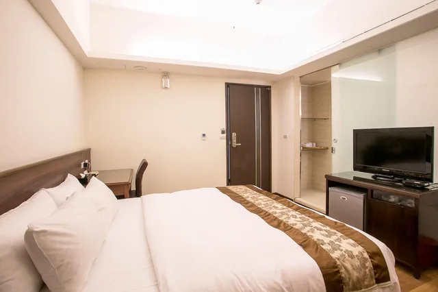 غرفة ديلوكس بسرير كينج، Huang Shin Business Hotel - ZhongGung Branch 1/4