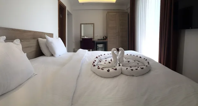 غرفة كومفورت بسرير كينج، Pegasus Hotel & Villa 2/3