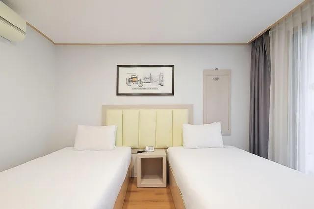 غرفة بسريرين منفصلين، Shin Shin Hotel Jeju City 2/5