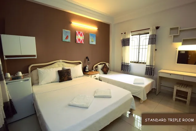 غرفة قياسية ثلاثية بسرير كوين وسرير فردي، Khoi Hostel 1/1