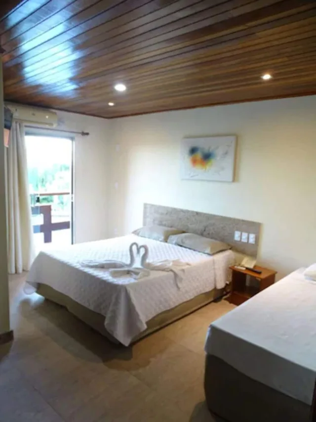 غرفة قياسية بسرير مزدوج وسرير فردي، Porto Bali Hotel 1/8