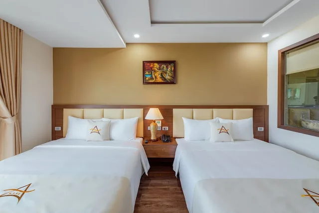 غرفة ديلوكس بسرير كوين وسرير فردي بإطلالة على الحديقة، Aquasun Hotel 2/7