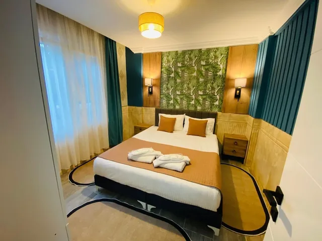 دوبلكس كومفورت بسريرين كوين بإطلالة على المسبح بشرفة مع أريكة، Royal Loft Suit 5/10