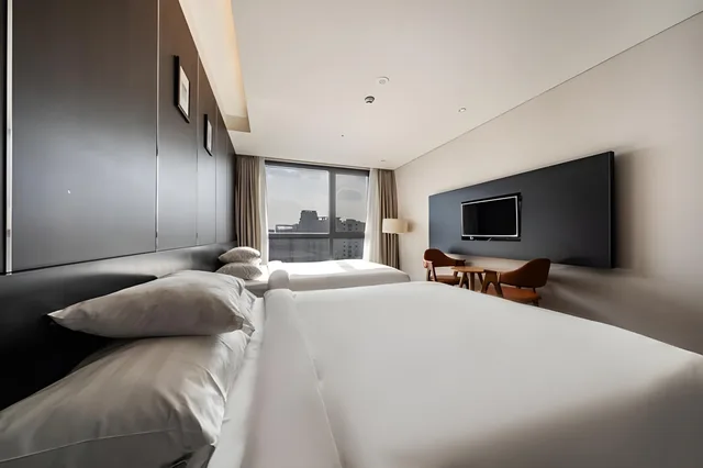 غرفة تنفيذية بسريرين منفصلين، Hotel Goldendaisy Seogwipo Ocean 1/1