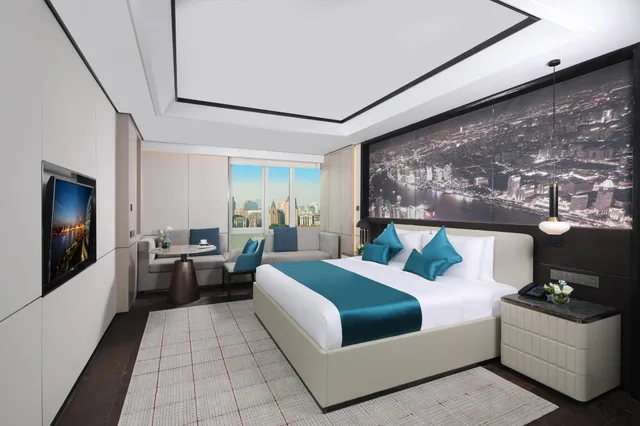 جناح بسرير كينج بإطلالة على النهر، Oriental Riverside Hotel Shanghai International Convention Center 1/2