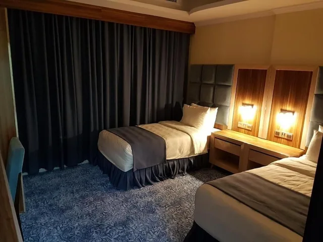 استوديو ديلوكس بسريرين منفصلين، فندق سويس بلو الزهراء(Swiss Blue Al Zahraa Hotel) 1/1