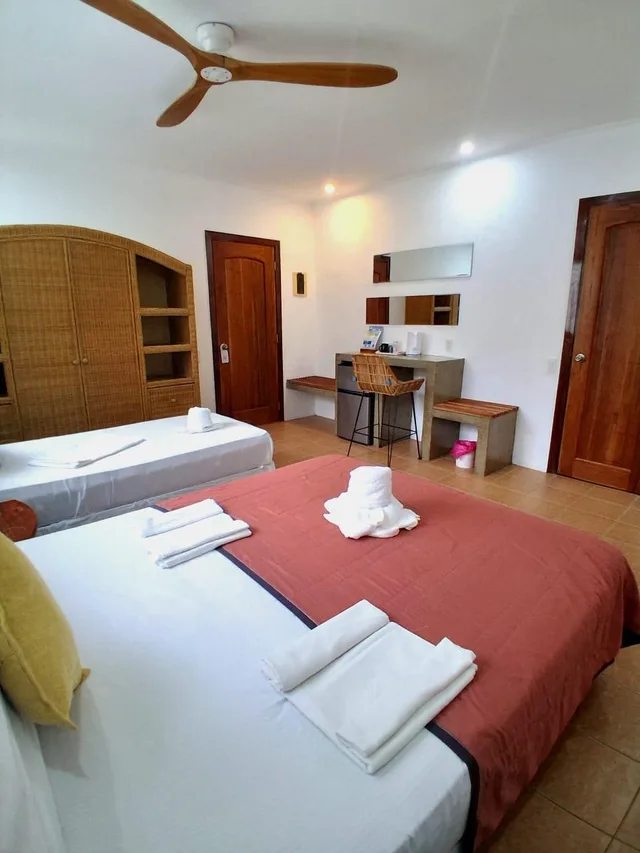 بنغل بسرير مزدوج وسرير فردي بإطلالة على الحديقة، Quo Vadis Dive Resort 2/3